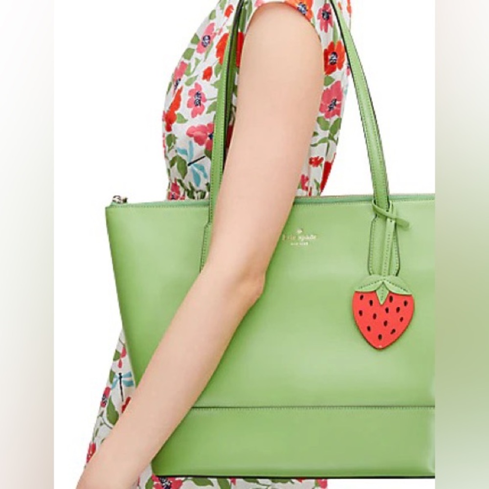 Kate Spade green tote with strawberry toggle